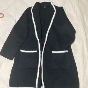 Black cardigan with white contrast fur
